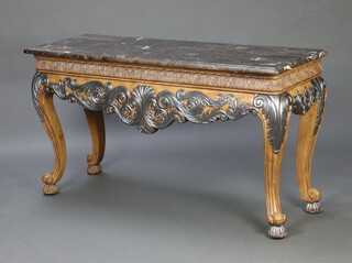 An Italian style carved walnut console table with faux marble top, raised on cabriole supports 81cm h x 152cm w x 51cm d 
