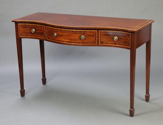 A Georgian style crossbanded mahogany side table of serpentine outline fitted 1 long and 2 short drawers, raised on square tapered supports, spade feet, 85cm h x 136cm w x 56cm d 