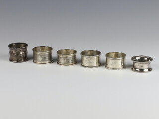 A silver napkin ring Birmingham 1918 and 5 others, 88 grams 