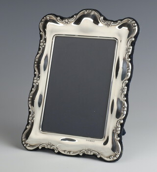 A modern silver photograph frame 21cm x 15cm 