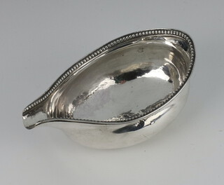 A George IV silver pap boat with beaded rim, London 1827, 39 grams 