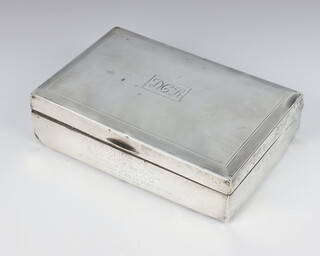 A rectangular silver engine turned cigarette box Birmingham 1929 17cm 