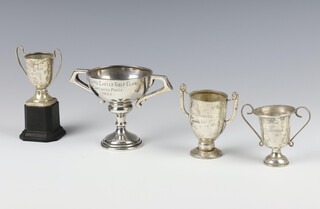 A silver 2 handled presentation trophy Birmingham 1932, 2 others, 164 grams and a ditto a/f on a wooden socle