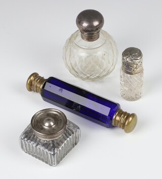 An Edwardian silver mounted cut glass scent bottle 6cm (no stopper), a globular ditto 18cm, 2 other items 