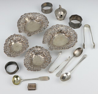 A pair of Edwardian repousse silver heart shaped bon bon dishes, 3 napkin rings and minor silver ware 180 grams 