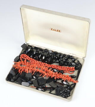 A natural coral necklace, a bead ditto and a quantity of jet beads