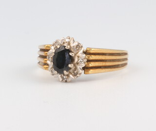 An 18ct yellow gold sapphire and diamond cluster ring, size O, 5 grams 