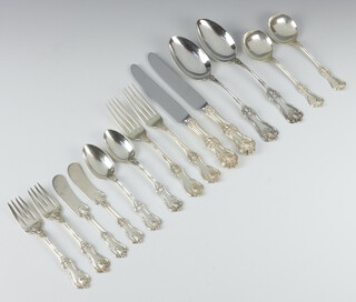 A set of Sterling silver cutlery comprising 2 tablespoons, 2 ladles, 2 teaspoons, 2 dessert forks, 2 cake forks and 2 butter knives, 522 grams together with 2 silver handled knives 