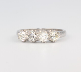 A white metal stamped plat. 4 stone diamond ring, 1.25ct, size O, 4.6 grams
