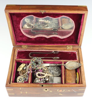 A silver bracelet and minor silver jewellery contained in a brass mounted trinket box 