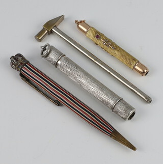 An Edwardian gilt gem set propelling pencil and 3 others 