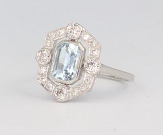 A white metal stamped plat. aquamarine and diamond ring, the centre stone 0.9ct, the brilliant cut diamonds 0.5ct, 3.9 grams, size N 