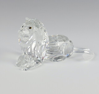A Swarovski figure of a lion, from The Inspiration Africa Series, annual edition 1995, 14cm boxed and with paperwork 