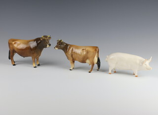 A Beswick figure no.1422 of a Jersey bull "Dunzally Cow Boy" by Arthur Gredington, gloss, 11.9cm together with no.1345 Jersey cow "Newton Kinkle" by Arthur Gredington, gloss 10.8cm (a/f) and no.1452A sow "Wool Queen" by Arthur Gredington 7cm 