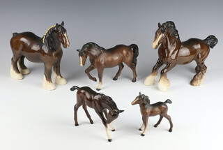 A Beswick figure of a stocky jogging mare 3rd version, brown gloss modelled by Arthur Gredington 14cm, a ditto foal 10cm and 3 Royal Doulton horses 