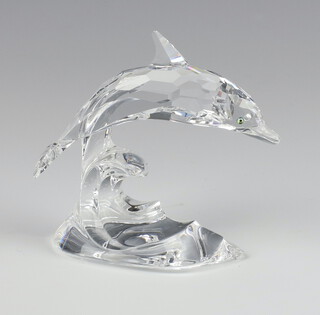 A Swarovski Crystal figure of a dolphin by Michael Stamey 7644000001 8cm with box and certificate 