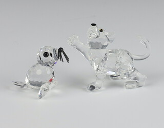 A Swarovski Crystal figure Lion Cub 760300001 and a seal with button nose 76630460000 both by Adi Stocker 