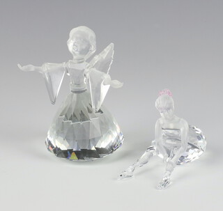 A Swarovski Crystal figure of an angel by Adi Stocker 7475000600 8cm (1 wing detached) and a young ballerina by Edith Mair 75500007 5cm, both boxed  