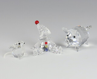 A Swarovski Crystal figure Puppet Clown by Gabriel Stamey 7550000003 5cm, ditto pig by Max Schreck 7638050000 3.5cm and a field mouse by Adi Stocker 7631025000 3cm 