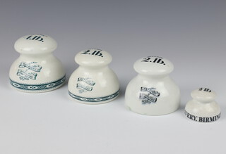 A set of ceramic shop weights by W & T Avery - 1/2 lb, 2 lbs, 2lbs and 4lbs 