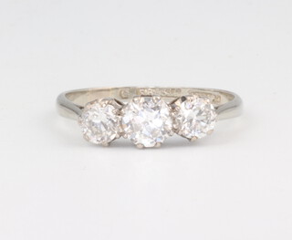 A white metal 18ct 3 stone diamond ring approx. 2.5 grams, 1.0ct, size Q 