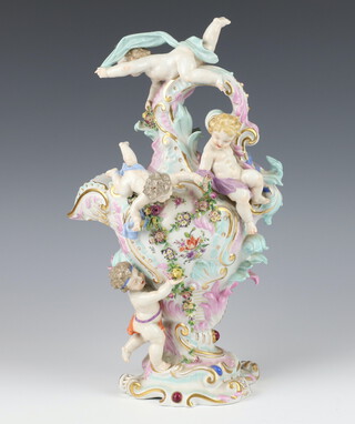 An early 20th Century German porcelain ewer decorated with cavorting cherubs and applied flowers on a rococo base 38cm 
