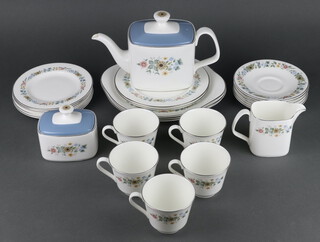 A Royal Doulton Pastoral part tea set comprising teapot (a/f), 5 tea cups, 5 saucers, 6 small plates, 2 medium plates, 3 sandwich plates, lidded sugar bowl and milk jug 