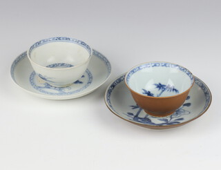 An 18th Century Chinese blue and white Nanking Cargo tea bowl and saucer decorated with flowers together with a ditto decorated with trees 