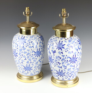 A pair of antique style Chinese blue and white brass mounted table lamps 40cm 