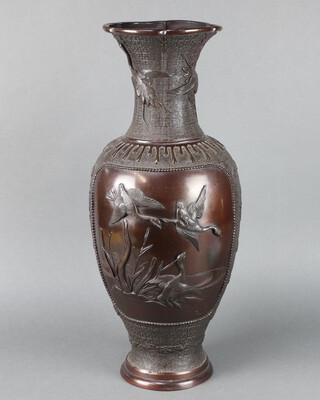 A 19th Century Japanese club shaped vase decorated storks raised on a circular foot 60cm h x 20cm w, the base with seal mark 