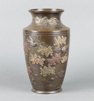 A 19th Century Japanese bronze vase decorated birds amidst branches, raised on a circular foot 31cm h x 11cm diam. 