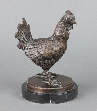 A bronze figure of a standing chicken, raised on a black veined marble base 19cm x 12cm 