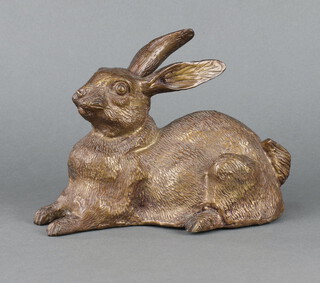 A bronze figure of a seated rabbit 16cm x 22cm x 12cm 