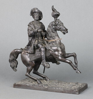 A Victorian bronze figure of a mounted nobleman with baton, raised on a rectangular naturalistic base 30cm h x 23cm w x 9cm d 