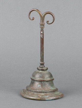 A Victorian brass bell shaped door stop, the back marked W T and S, 25cm x 12cm x 6cm 
