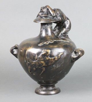 After the antique, a bronze twin handled and lidded urn decorated a crab to the top 31cm x 24cm 