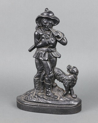 A Victorian cast iron doorstop in the form of a standing woodsman and dog 32cm h x  22cm x 6cm 