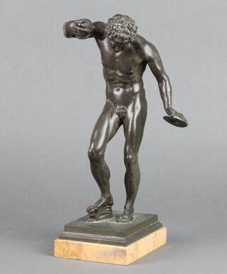 After the antique a bronze figure of a dancing faun with cymbals raised on a rectangular pink veined marble base 28cm x 13cm x 10cm