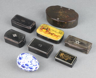 A 19th Century Masonic horn snuff box decorated square and compass 2cm x 6cm x 3cm, 6 other snuff boxes and a porcelain jar and cover in the form of an egg 