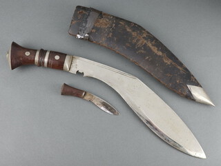 A Kukri with 30cm blade and leather scabbard together with 1 skinning knife 