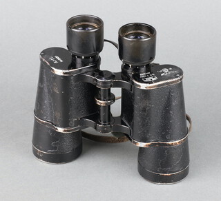 Carl Zeiss, a pair of Third Reich Kreigsmarine binoculars marked T Carl Zeiss D.F.7x50 2073043 Artl Nr8920 together with a carrying case 