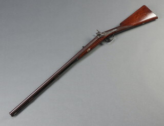 Downeng, a muzzleloading double barrelled fouling percussion sporting shotgun, the 72cm Damascus barrels marked Downeng London and with London proof marks and having 3 folding foresights, engraved hammers and walnut stock 