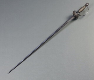 A 17th/18th Century double bladed sword the 72cm blade etched figures and having a polished steel shell guard and steel grip 