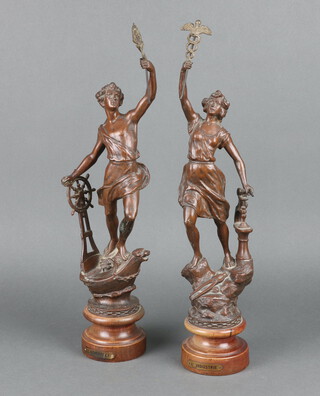 A pair of 1920's French spelter figures depicting Industry marked L'Industrie and Le Commerce, raised on turned socle bases 50cm x 9cm  