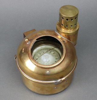 A compass marked no.1089 contained within a brass binnacle 20cm x 21cm 