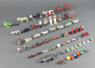 A collection of Britains farmyard figures (play worn)