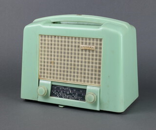 An Ecko Type U122 radio contained in a green Bakelite case 22cm h x 27cm w x 15cm d 