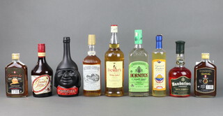 A litre bottle of Dewars White Label Scotch Whisky, a 70cl bottle of Southern Comfort, a 700ml bottle of Mandarinetto liqueur, a 70cl bottle of Ron Miel Guanche rum liqueur, a 350ml bottle of Guanche, a bottle of Reposado Hornitos, bottle of Liquore Di Mandarini, bottle of Pisco and a 70cl bottle of White Country Satin  