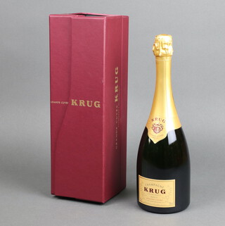 A bottle of Grande Cuvee Krug champagne, in presentation box  