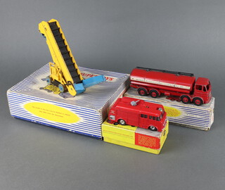A Dinky Supertoys 964 elevator loader, a Dinky 943 Leyland Octopus tanker, Dinky 276 airport fire tender with flashing light, all boxed.